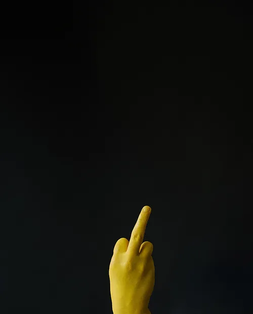 A single hand gesture of the middle finger.
